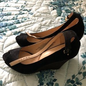 Black and gold strappy heels.